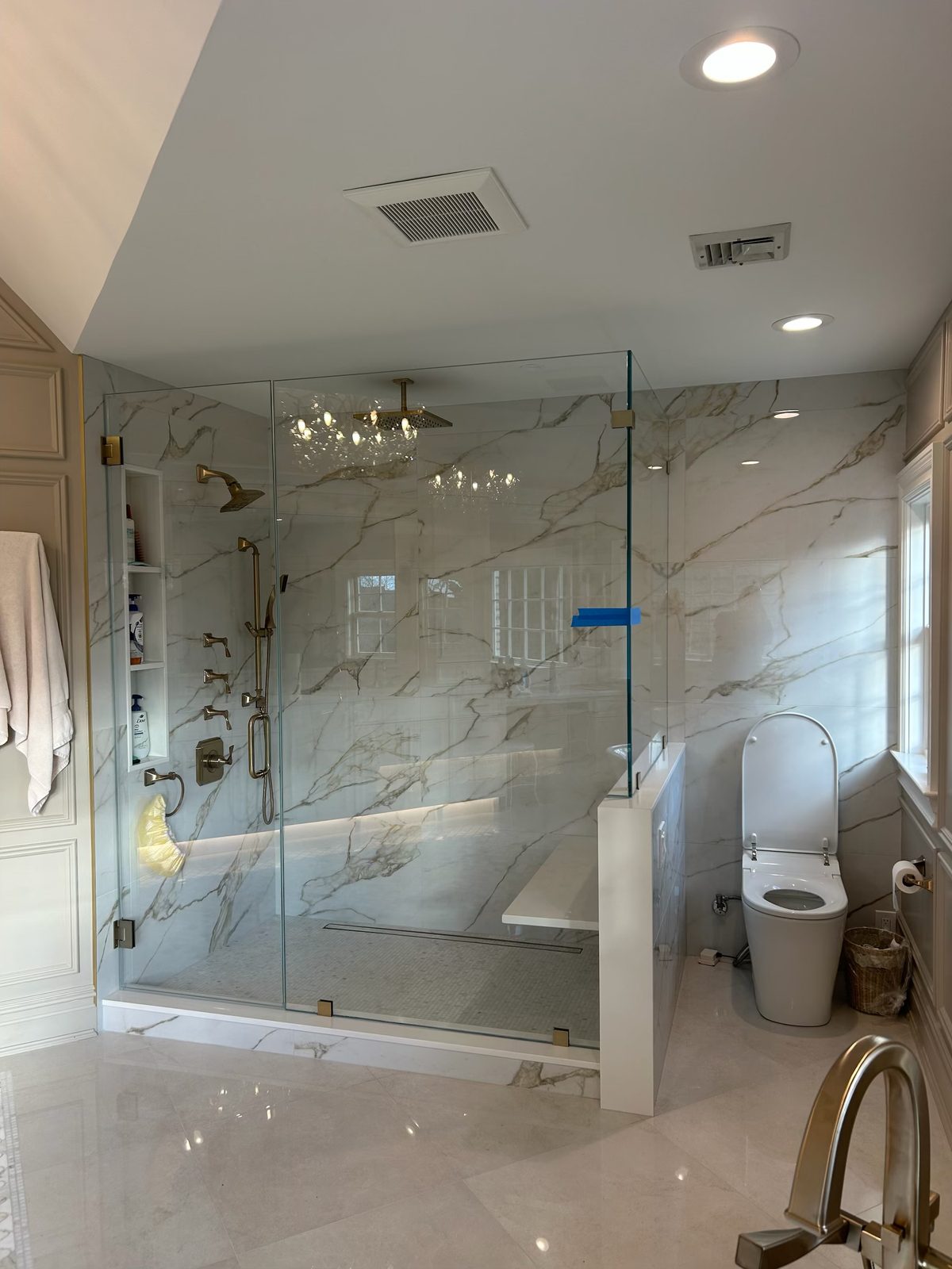 Gold-Vein Marble Floor-to-Ceiling Shower